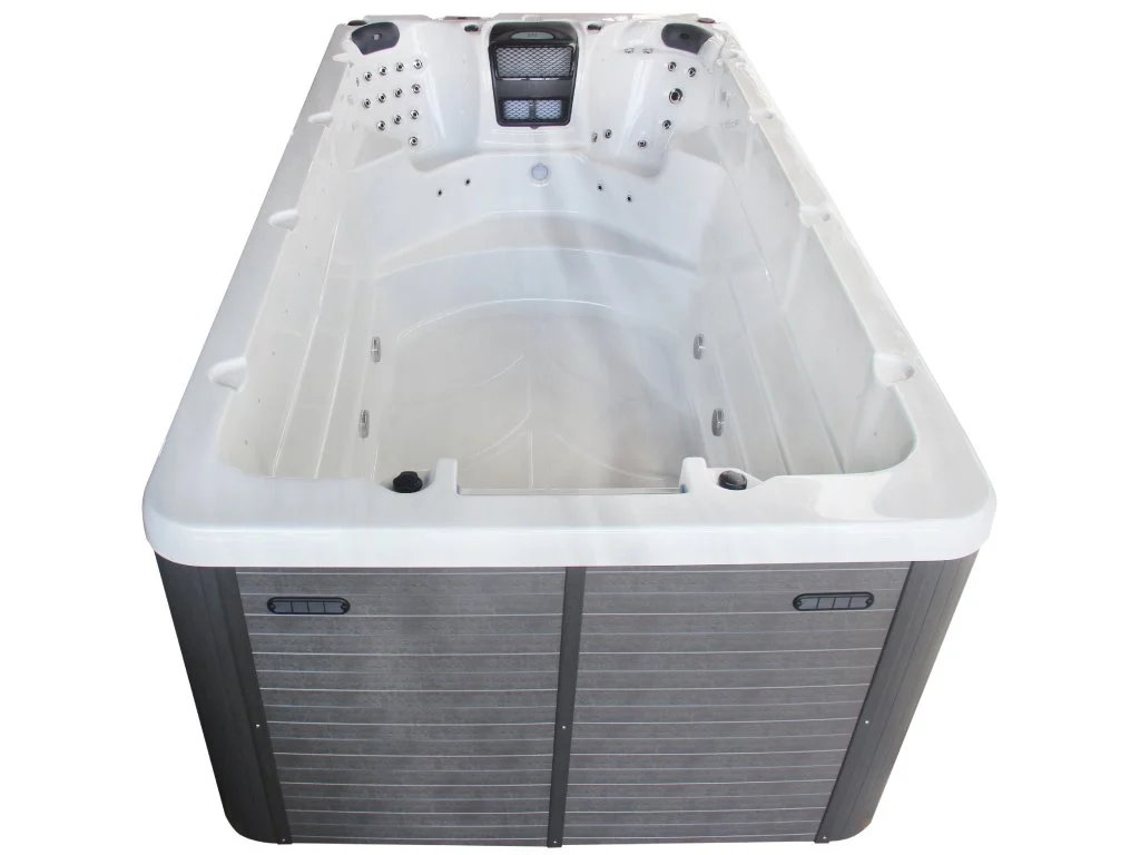 Piscina Swim Spa 805 are o formă rectangulară, cu un interior alb și un exterior de culoare gri, având un design modern și elegant, dotată cu jeturi de hidromasaj și un spațiu pentru două persoane.