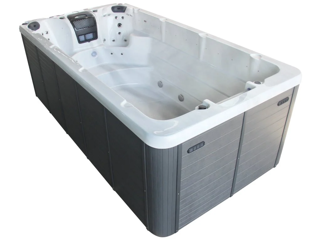 Piscină de tip Swim Spa 805, cu un design rectangular, de culoare albă la interior și cu un finisaj gri pe exterior, având mai multe jeturi de masaj și o zonă de relaxare pentru două persoane, potrivită pentru înot și relaxare.